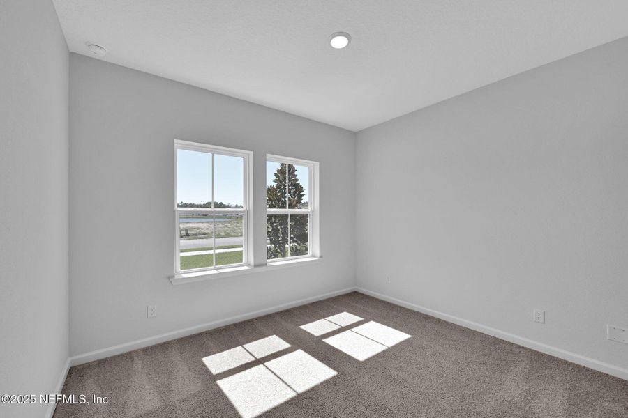 Spacious, unfurnished interior of a new home in McGirt's Creek, Yulee (Image 34).