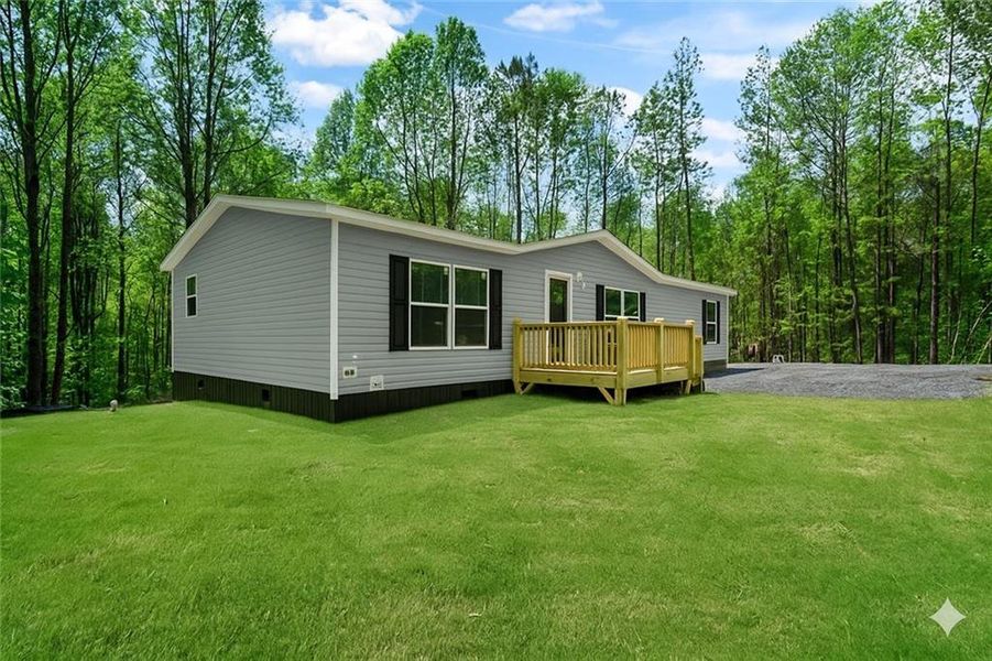 Exterior details and patio area of a home in , Ellijay (Image 26).
