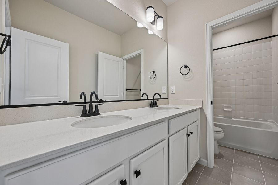 Furnished interior view inside a new home in The Aurora Highlands, Aurora (Image 10).