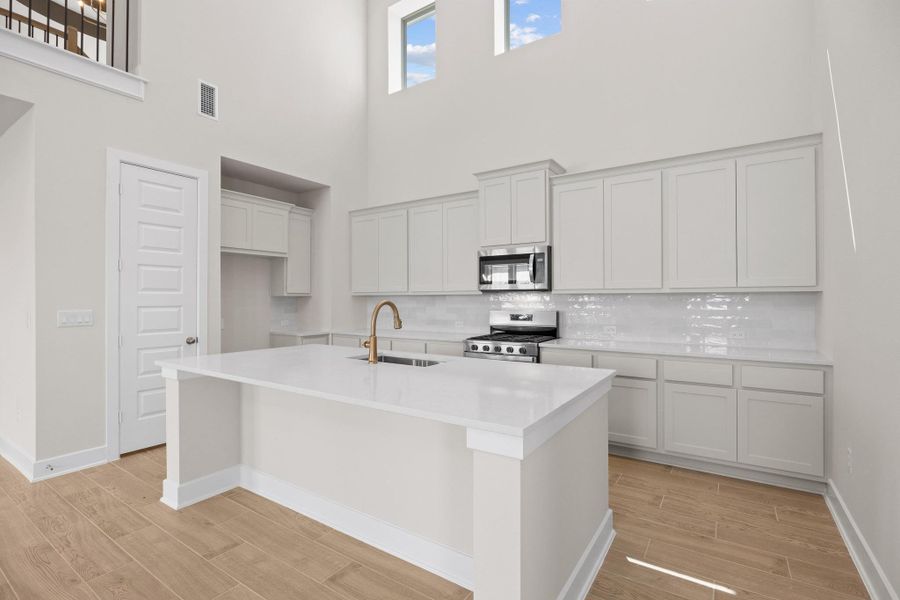 Furnished interior view inside a new home in Parmer Ranch, Georgetown (Image 5).