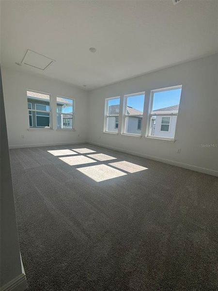 Spacious, unfurnished interior of a new home in Laureate Park, Orlando (Image 19).