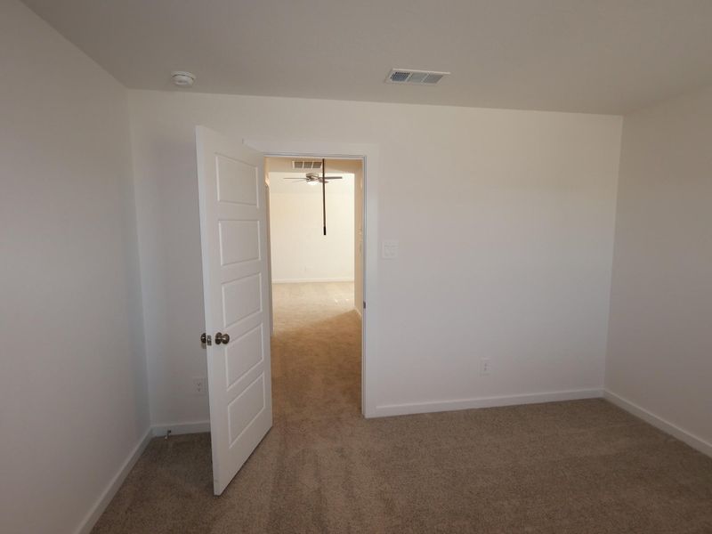 Spacious, unfurnished interior of a new home in Pinewood at Grand Texas, New Caney (Image 13).