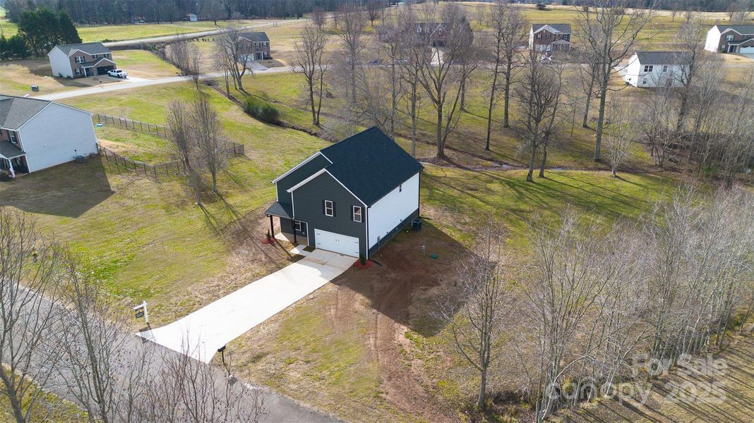 Front exterior of a new home in , Shelby, NC, highlighting curb appeal (Image 19).