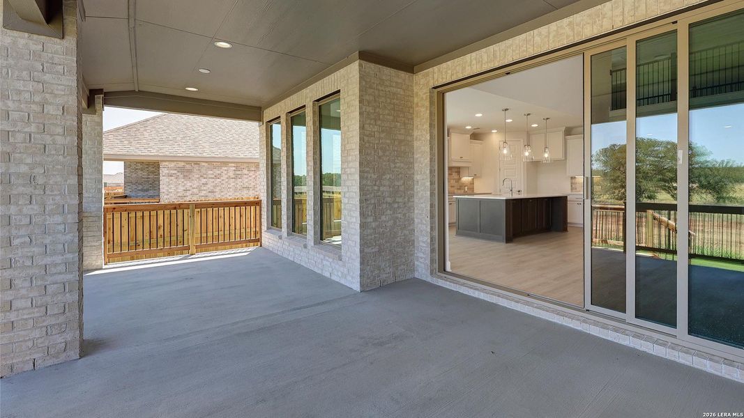 Exterior details and patio area of a home in Alsatian Oaks, Castroville (Image 3).
