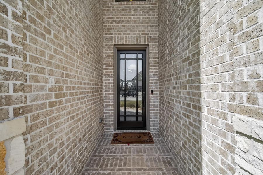 Exterior details and patio area of a home in Sunterra, Katy (Image 28). Exterior details and patio area of a home in Sunterra, Katy (Image 28).