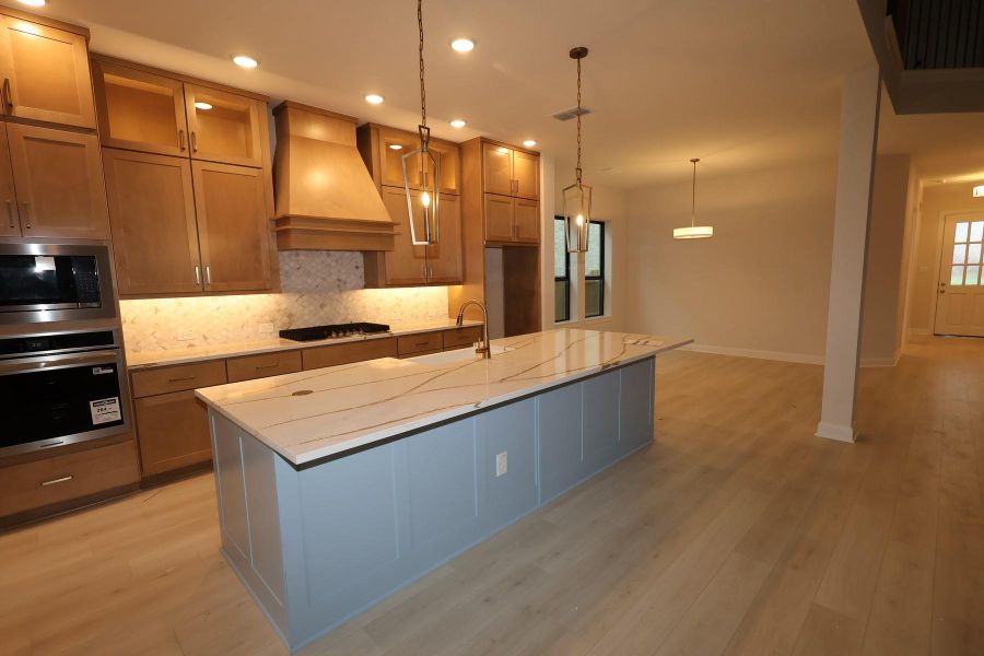 Furnished interior view inside a new home in Riceland 60’ Homesites, Mont Belvieu (Image 5).