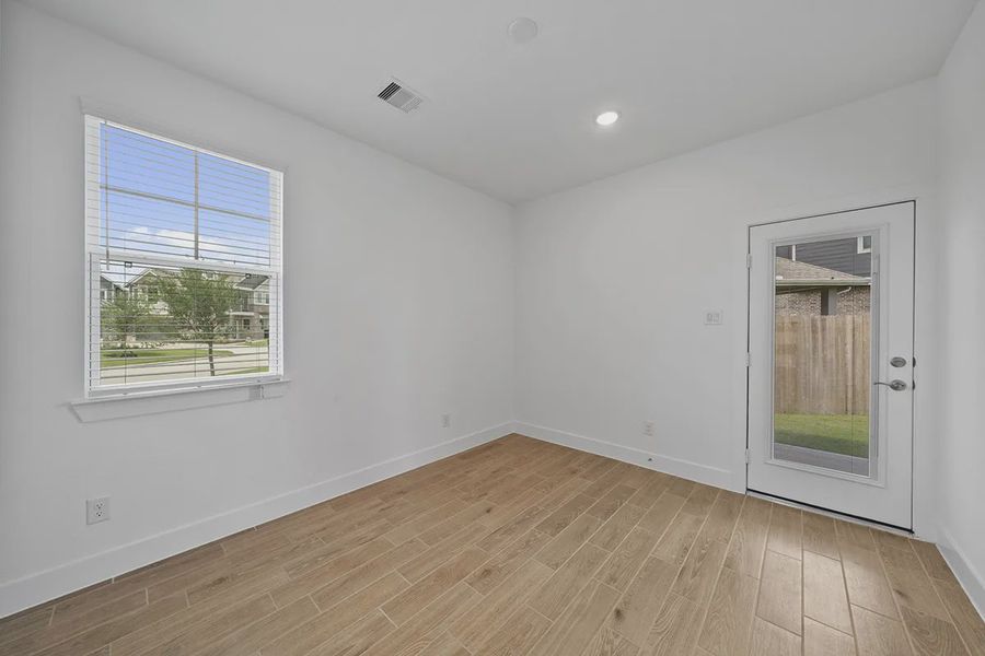 Spacious, unfurnished interior of a new home in Elyson Courtyard Collection, Katy (Image 11).