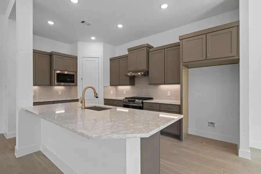 Furnished interior view inside a new home in The Woodlands Hills, Willis (Image 10). Furnished interior view inside a new home in The Woodlands Hills, Willis (Image 10).