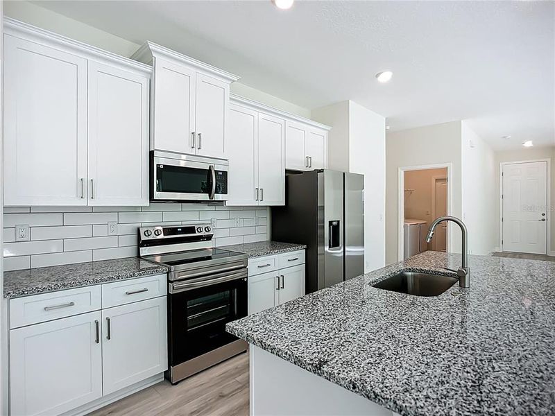 Furnished interior view inside a new home in , North Port (Image 4).