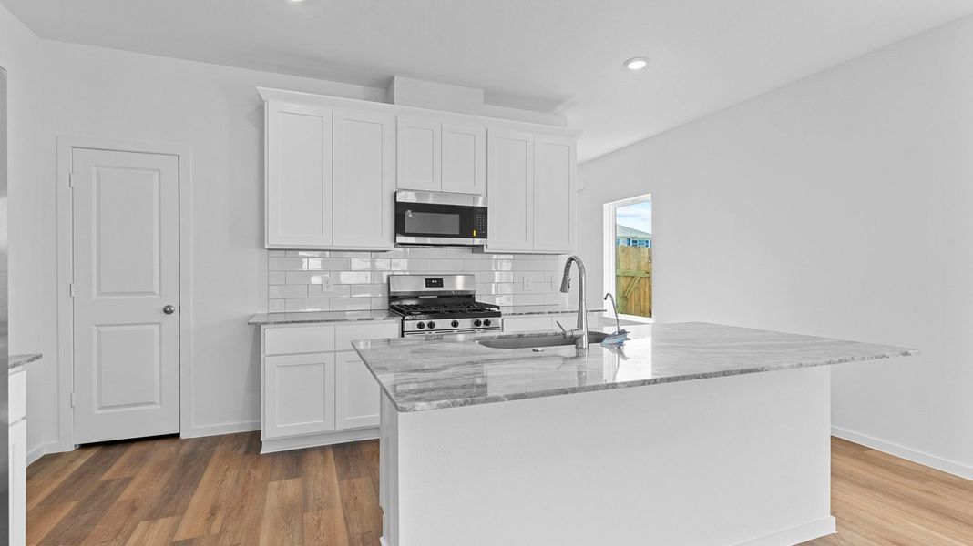 Furnished interior view inside a new home in Tamarron, Fulshear (Image 7).