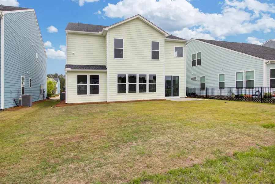 Exterior details and patio area of a home in Homecoming, Ravenel (Image 2).
