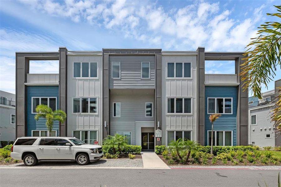 Front exterior of a new home in , Kissimmee, FL, highlighting curb appeal (Image 1).