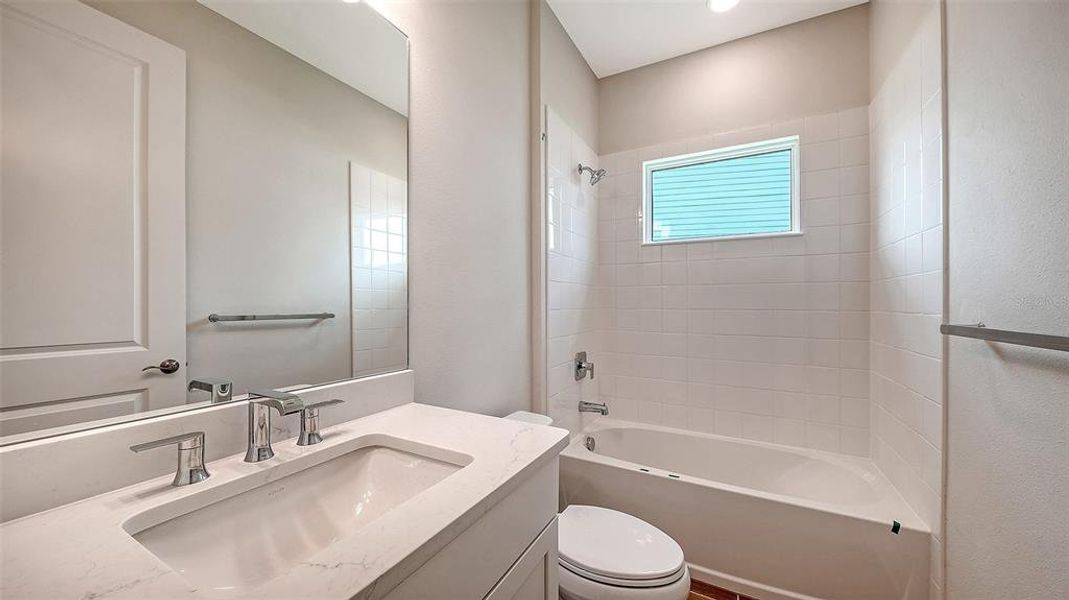 Furnished interior view inside a new home in Grand Park, Sarasota (Image 12).