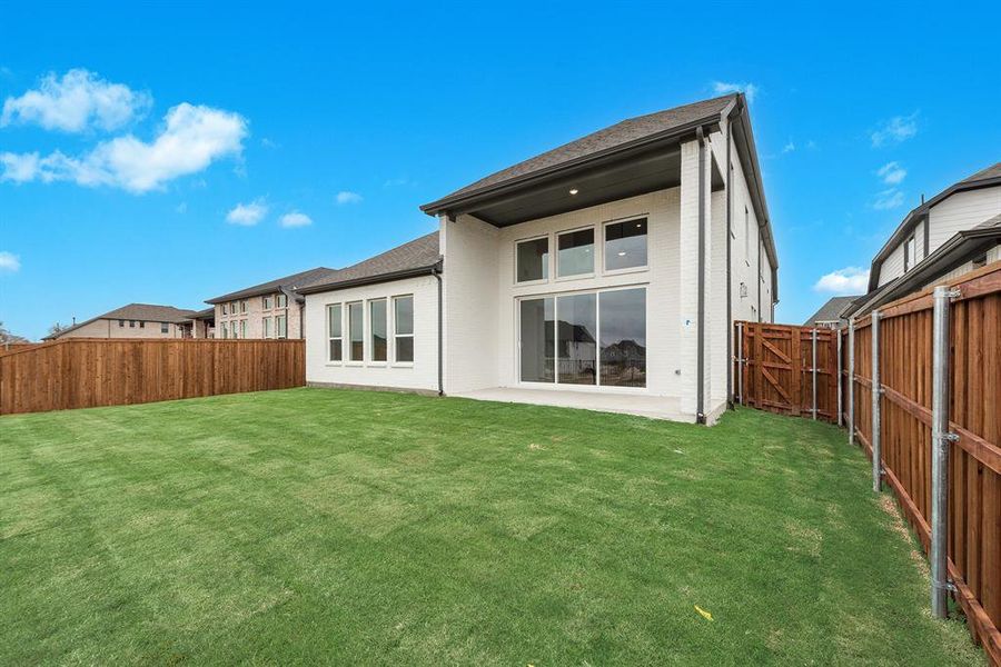 Front exterior of a new home in Devonshire, Forney, TX, highlighting curb appeal (Image 21). Front exterior of a new home in Devonshire, Forney, TX, highlighting curb appeal (Image 21).