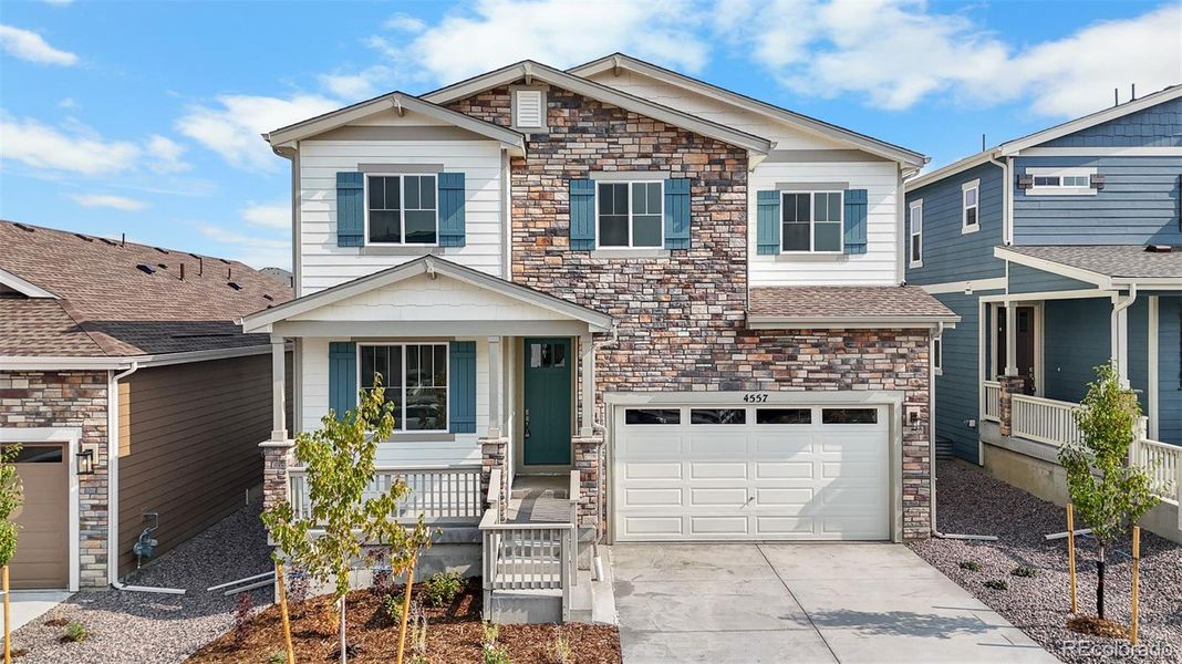 Front exterior of a new home in , Castle Rock, CO, highlighting curb appeal (Image 27). Front exterior of a new home in , Castle Rock, CO, highlighting curb appeal (Image 27).