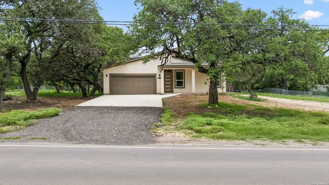 Front exterior of a new home in , San Antonio, TX, highlighting curb appeal (Image 18).