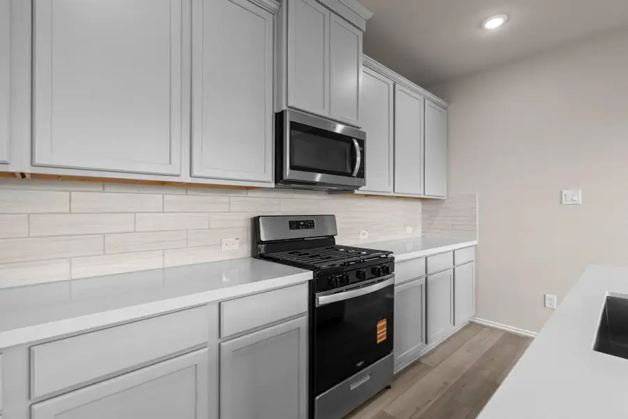 Furnished interior view inside a new home in Bridgeland, Cypress (Image 10).