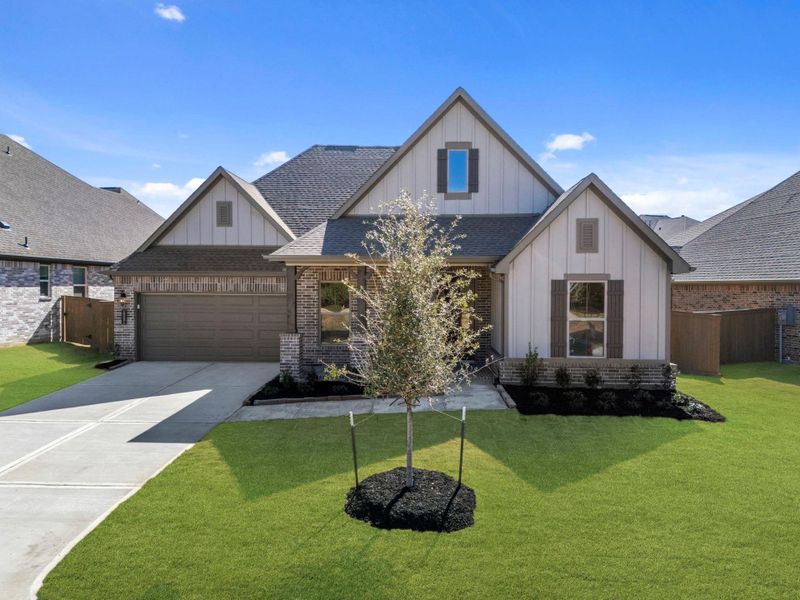 Front exterior of a new home in Chambers Creek, Willis, TX, highlighting curb appeal (Image 22).