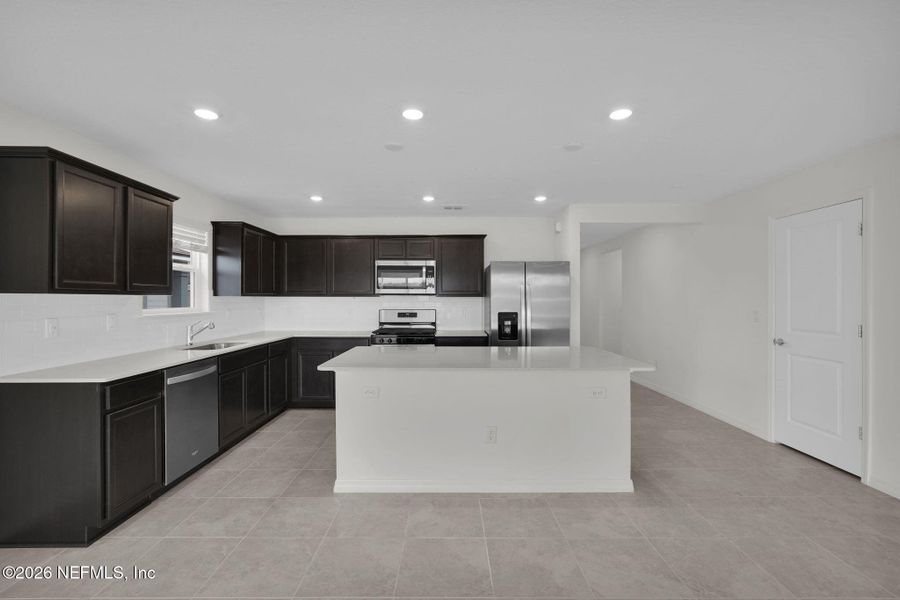 Furnished interior view inside a new home in Wells Landing, Jacksonville (Image 6).