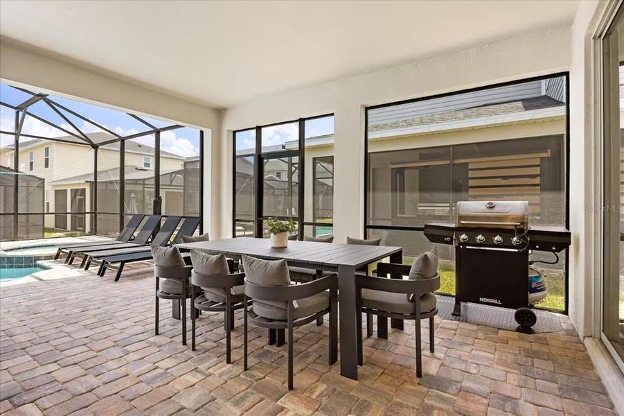 Exterior details and patio area of a home in Solara Resort, Kissimmee (Image 25).