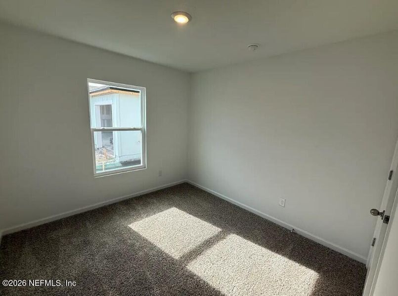 Spacious, unfurnished interior of a new home in Sawmill Branch, Palm Coast (Image 16).