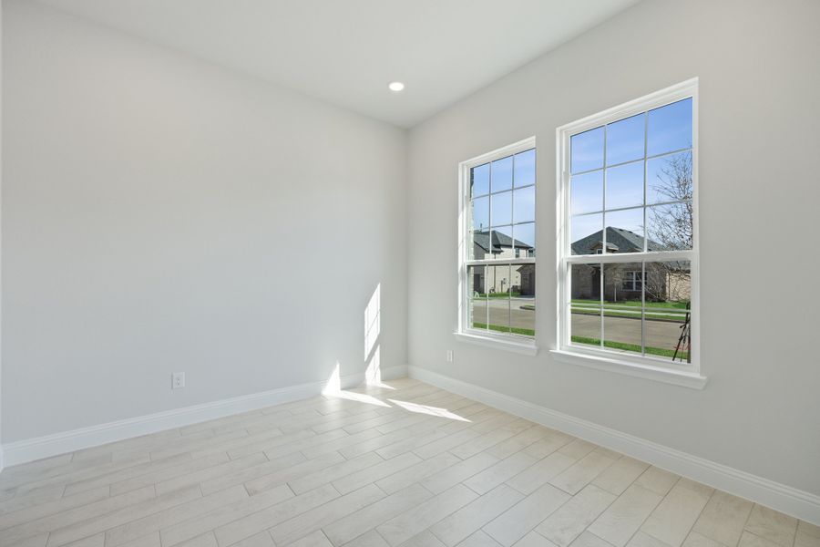 Representative unfurnished interior of a home built from the Waverly III by Megatel Homes in Bellagio, Forney (Image 12).