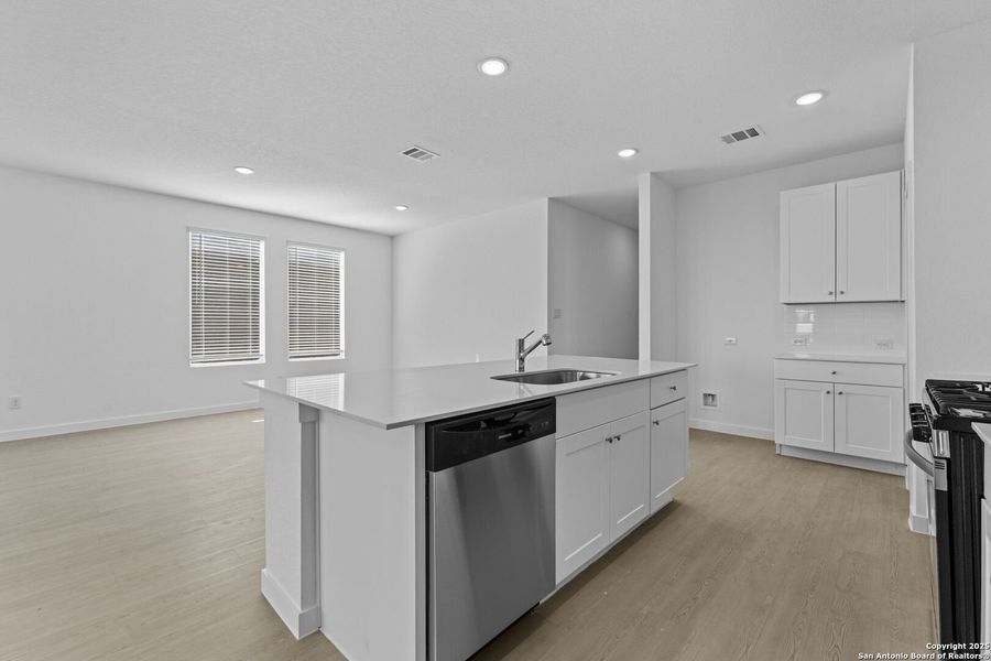 Furnished interior view inside a new home in Waterwheel: Coastline Collection, San Antonio (Image 4).