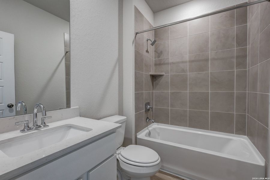 Furnished interior view inside a new home in Cinco Lakes, San Antonio (Image 7).