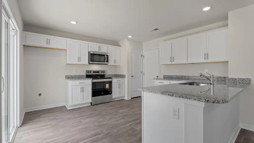 Furnished interior view inside a new home in Jetstream Park, Wilson (Image 5).