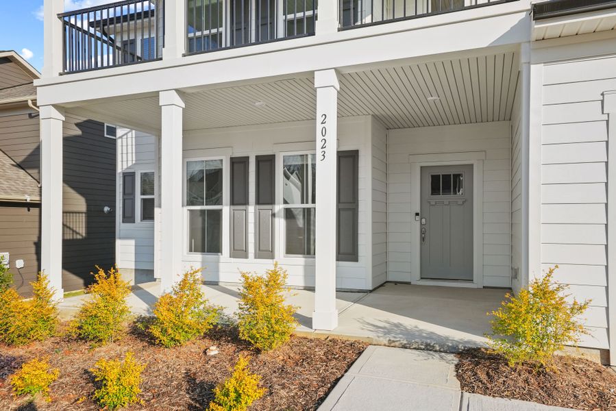 Exterior details and patio area of a home in Forest Creek, Waxhaw (Image 27).