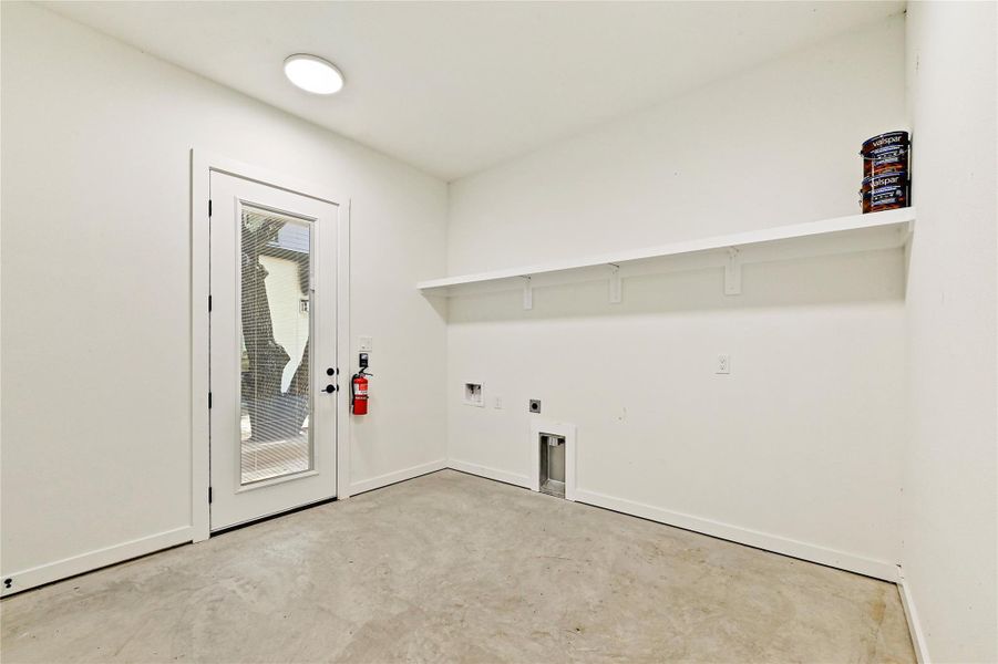Casita laundry room with built-in shelving, located in the oversized garage. Casita laundry room with built-in shelving, located in the oversized garage.