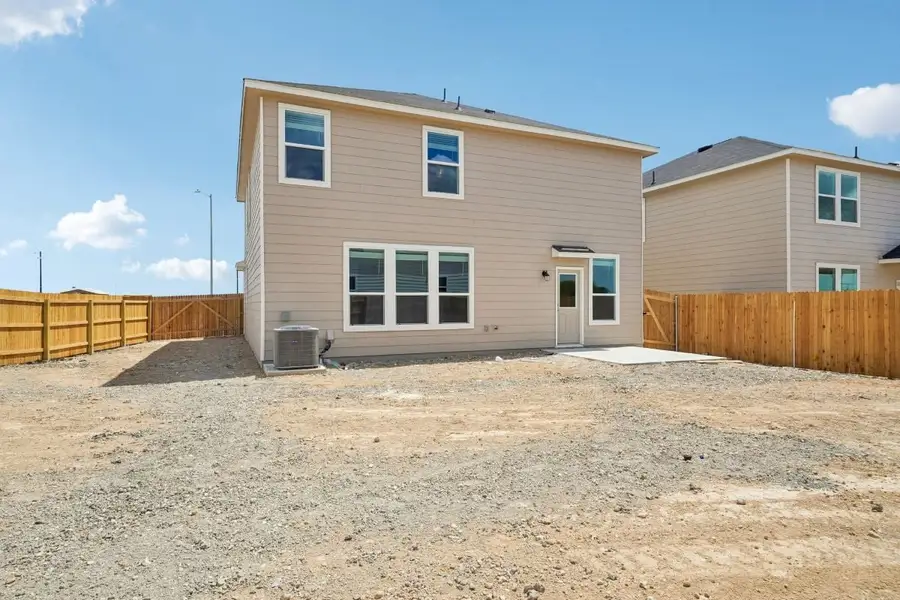 Exterior details and patio area of a home in Preserve at Culebra - Sterling Collection, San Antonio (Image 4).