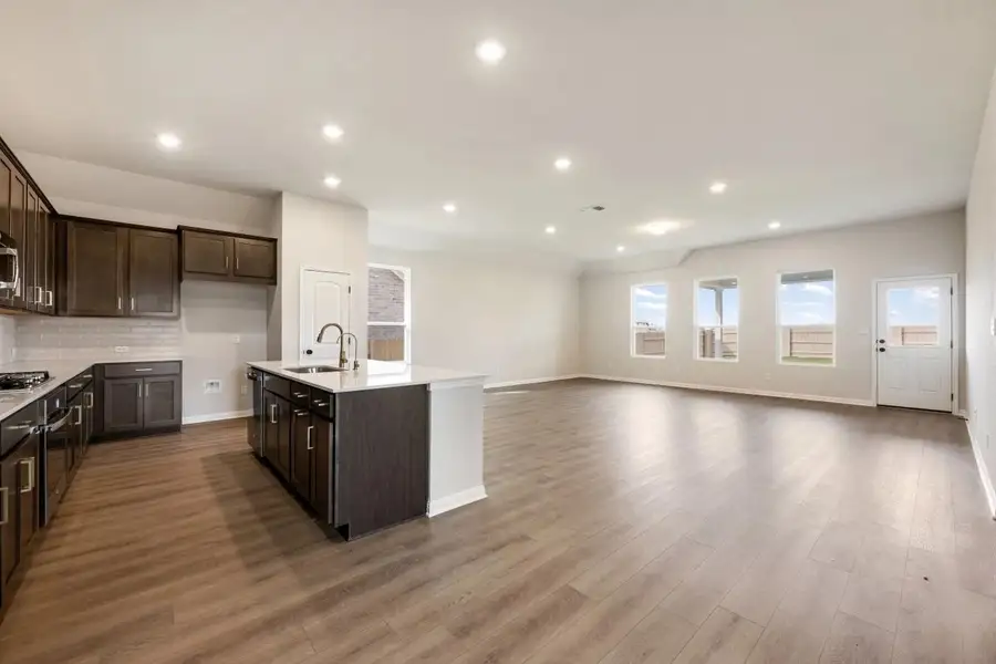 Furnished interior view inside a new home in The Colony 50s, Bastrop (Image 6).