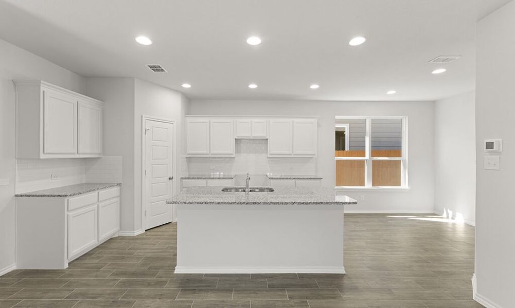 Representative exterior photo of a completed home built from the Thorndale by Impression Homes in Heartland, Heartland, TX (Image 6). Representative exterior photo of a completed home built from the Thorndale by Impression Homes in Heartland, Heartland, TX (Image 6).