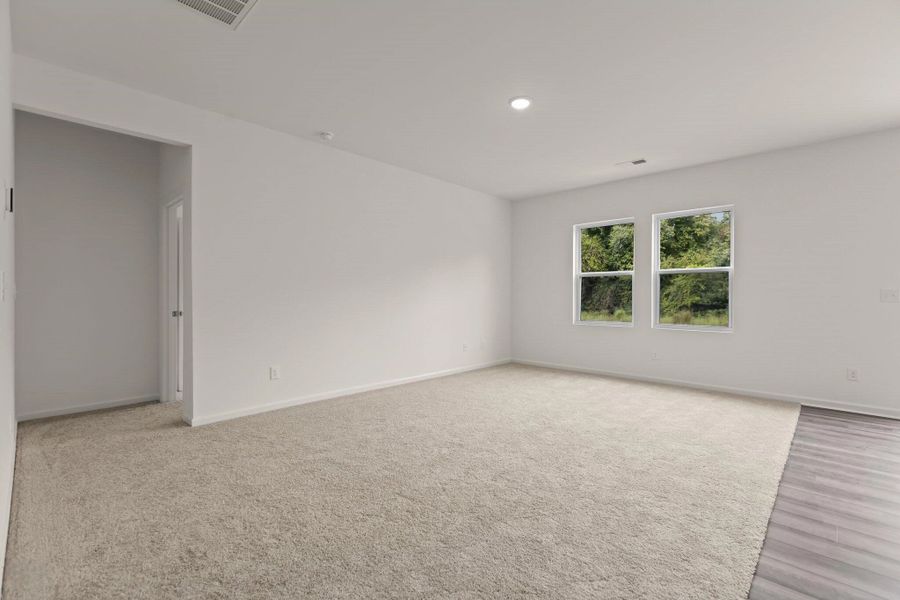 Representative unfurnished interior of a home built from the Hubble by Starlight Homes in Bayview, Conway (Image 16).