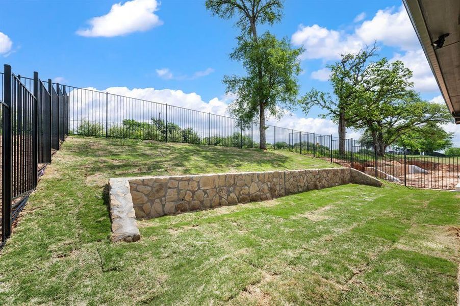 Exterior details and patio area of a home in The Resort on Eagle Mt. Lake, Fort Worth (Image 21). Exterior details and patio area of a home in The Resort on Eagle Mt. Lake, Fort Worth (Image 21).