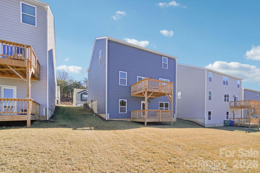 Exterior details and patio area of a home in Rydele Heights, Asheville (Image 18). Exterior details and patio area of a home in Rydele Heights, Asheville (Image 18).