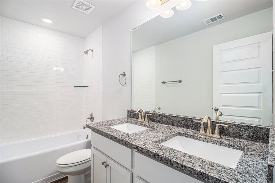 Main Bathroom with Double Vanity Sinks