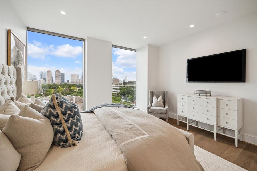 Alternate view of primary bedroom. Photos are of a similar unit with the same floor plan