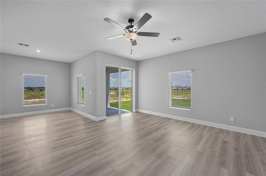 Spacious, unfurnished interior of a new home in Gum Lake Preserve, Lake Alfred (Image 24).