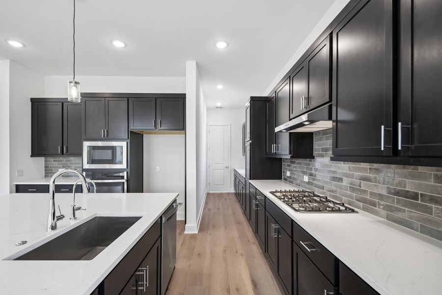 Furnished interior view inside a new home in Freedom at Anthem, Kyle (Image 4).