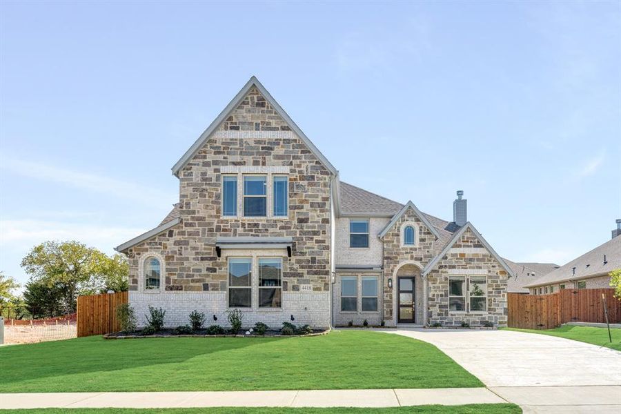 Front exterior of a new home in Ridgepoint, Midlothian, TX, highlighting curb appeal (Image 24). Front exterior of a new home in Ridgepoint, Midlothian, TX, highlighting curb appeal (Image 24).