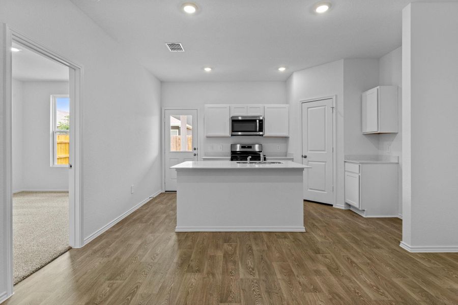Furnished interior view inside a new home in , Kyle (Image 5).