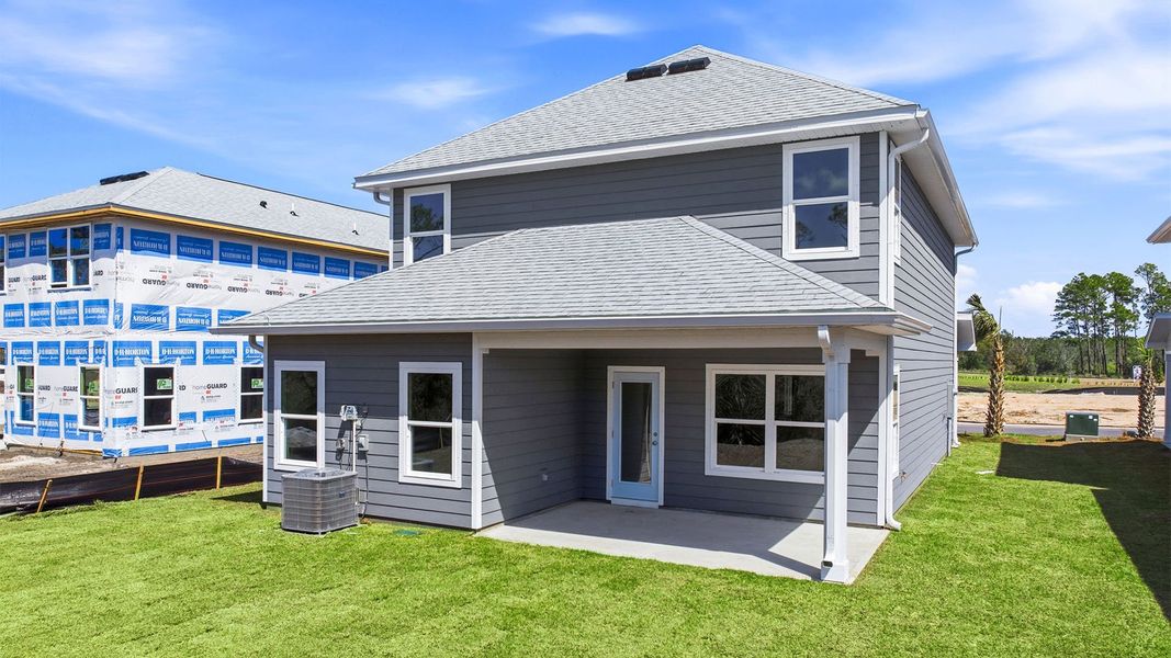 Exterior details and patio area of a home in Buffer Farms, Port Saint Joe (Image 4).