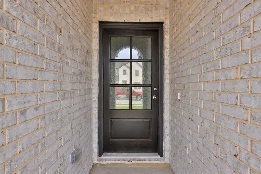 Exterior details and patio area of a home in Sunterra, Katy (Image 2). Exterior details and patio area of a home in Sunterra, Katy (Image 2).