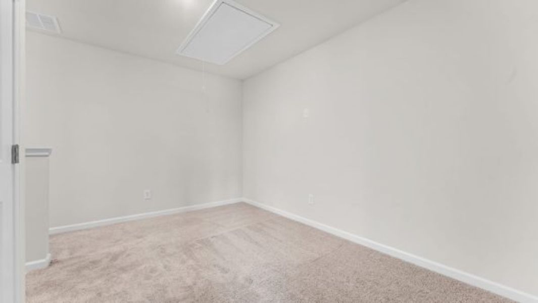 Representative unfurnished interior of a home built from the Bramblewood Townhome by Piedmont Residential in The Retreat at Browns Ridge, Newnan (Image 13).