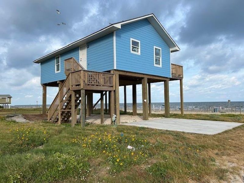 Front exterior of a new home in , Galveston, TX, highlighting curb appeal (Image 1). Front exterior of a new home in , Galveston, TX, highlighting curb appeal (Image 1).