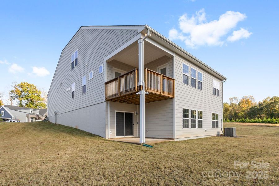 Exterior details and patio area of a home in Bell Farm: 60's, Statesville (Image 3).