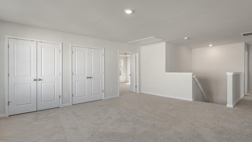 Spacious, unfurnished interior of a new home in Indigo Preserve, Leland (Image 31).