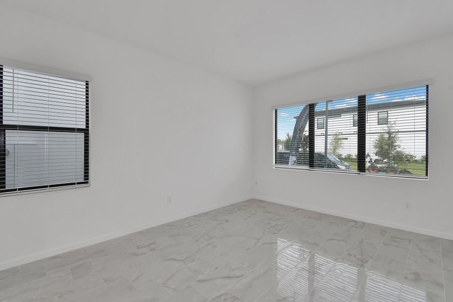 Representative unfurnished interior of a home built from the Sandalwood II by Park Square Residential in Paradiso Grande, Orlando (Image 13).